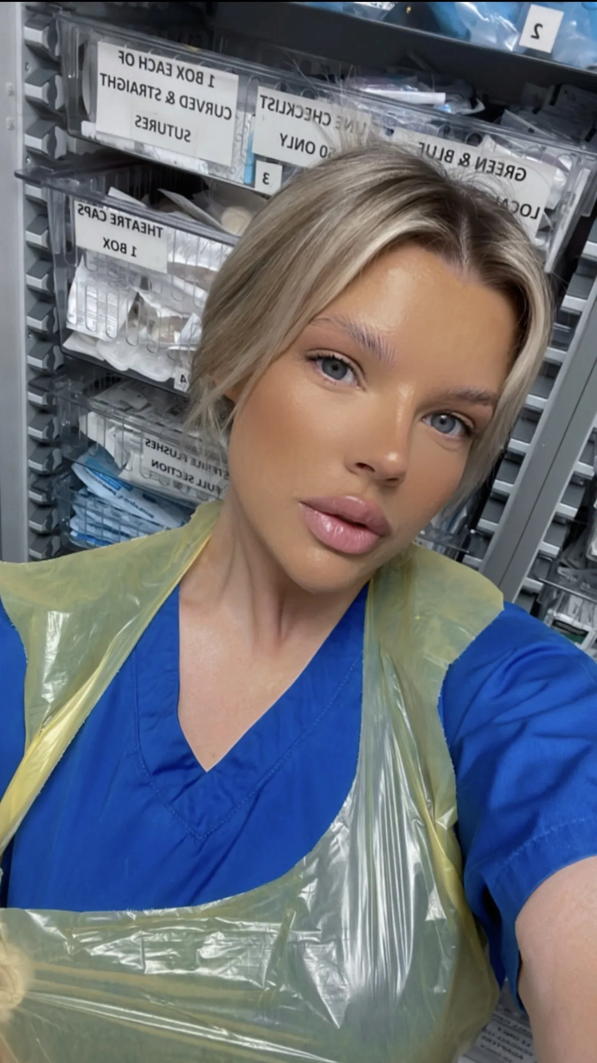 Ashleigh Trickett in scrubs and protective equipment during her NHS critical care work